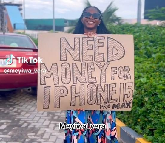 How a Video of a Lady Begging for Money with a Placard Went Viral on Social Media Platforms